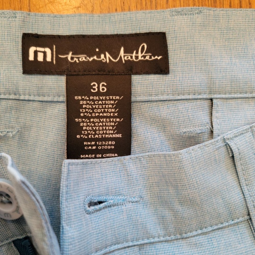 Travis Mathew men's shorts in blue-green sized 36
